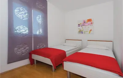 Krevet ili kreveti u jedinici u objektu Two-Bedroom Apartment In Vodice