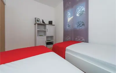 Krevet ili kreveti u jedinici u objektu Two-Bedroom Apartment In Vodice