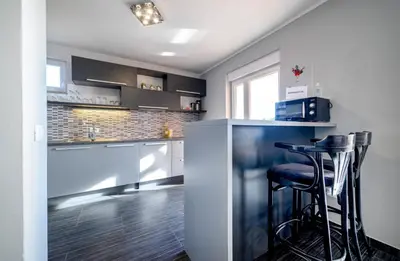 Kuhinja ili čajna kuhinja u objektu Apartments Oto