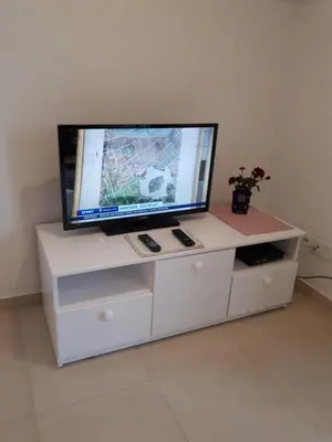TV i/ili zabavni centar u objektu Apartments Mila