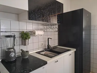Kuhinja ili čajna kuhinja u objektu Apartment Summer