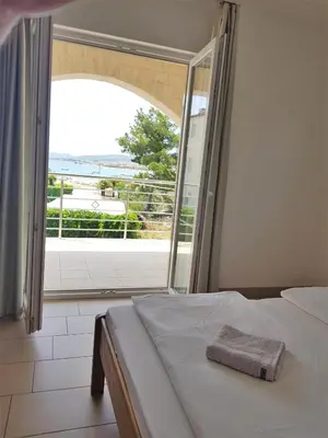 Krevet ili kreveti u jedinici u objektu Apartments Palaca Sunca