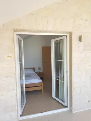 Krevet ili kreveti u jedinici u objektu Apartments Palaca Sunca