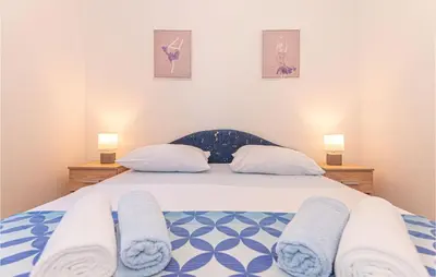 Krevet ili kreveti u jedinici u objektu Six-Bedroom Holiday Home In Sibenik