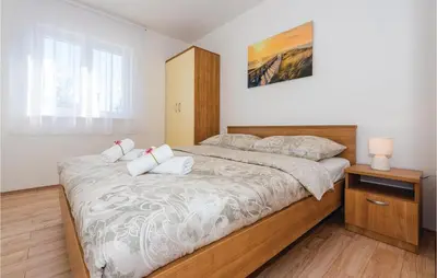 Krevet ili kreveti u jedinici u objektu Six-Bedroom Holiday Home In Rogoznica