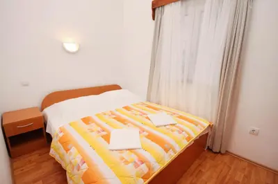 Krevet ili kreveti u jedinici u objektu Apartments by the sea Rogoznica - 3262