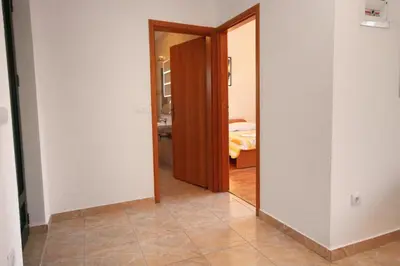Krevet ili kreveti u jedinici u objektu Apartments by the sea Rogoznica - 3262