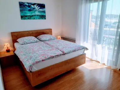 Krevet ili kreveti u jedinici u objektu Apartments Tiho&Marija