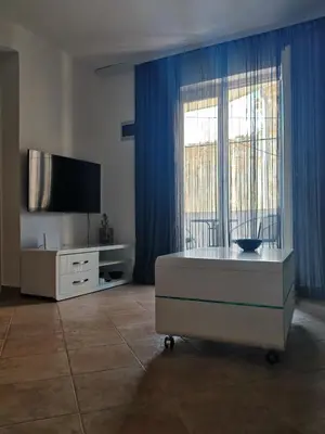TV i/ili zabavni centar u objektu Apartments Marin