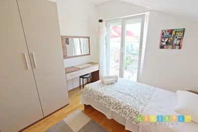 Krevet ili kreveti u jedinici u objektu Apartments Šuperba