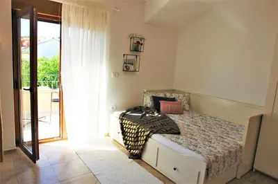 Krevet ili kreveti u jedinici u objektu Iva Apartmani