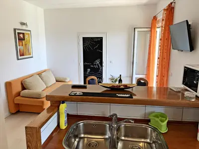 TV i/ili zabavni centar u objektu Apartments Villa RA
