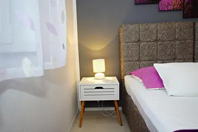 Krevet ili kreveti u jedinici u objektu Apartments Villa RA