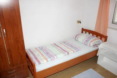 Krevet ili kreveti u jedinici u objektu Apartment with Sea View in Zečevo Rogozničko – 65 sqm with Balcony