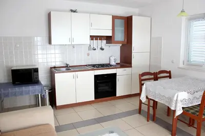 Kuhinja ili čajna kuhinja u objektu Apartment with Sea View in Zečevo Rogozničko – 65 sqm with Balcony