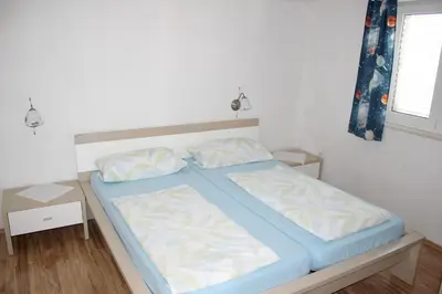 Krevet ili kreveti u jedinici u objektu Cosy Apartment in Zečevo Rogozničko with Parking