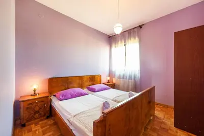 Krevet ili kreveti u jedinici u objektu Family friendly seaside apartments Zaton, Krka - 12416