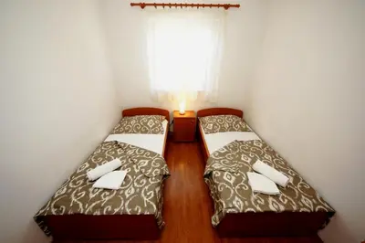 Krevet ili kreveti u jedinici u objektu Dalmacia apartments