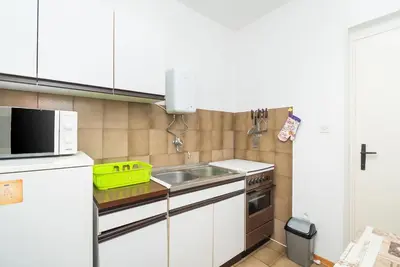 Kuhinja ili čajna kuhinja u objektu Apartment Neda