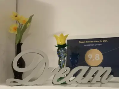 Certifikat, nagrada, logo ili neki drugi dokument izložen u objektu Apartman Dream