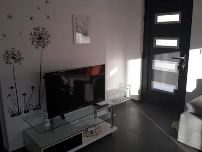 TV i/ili zabavni centar u objektu Apartman Dream