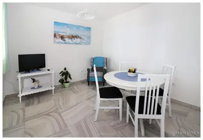 TV i/ili zabavni centar u objektu Apartments Primosten, Dolac