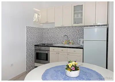 Kuhinja ili čajna kuhinja u objektu Apartments Primosten, Dolac