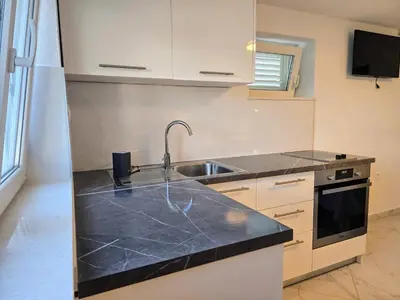 Kuhinja ili čajna kuhinja u objektu Apartments Primosten, Dolac