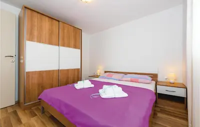 Krevet ili kreveti u jedinici u objektu Two-Bedroom Apartment In Dolac