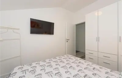 Krevet ili kreveti u jedinici u objektu Two-Bedroom Apartment In Brodarica