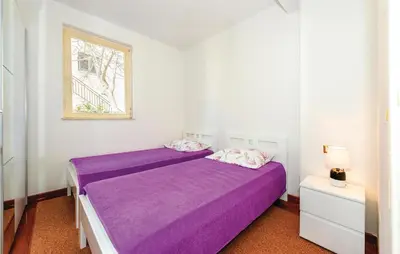 Krevet ili kreveti u jedinici u objektu Three-Bedroom Apartment In Rogoznica