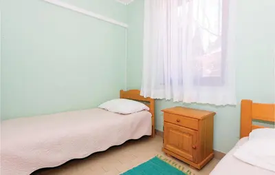 Krevet ili kreveti u jedinici u objektu Two-Bedroom Apartment In Rogoznica