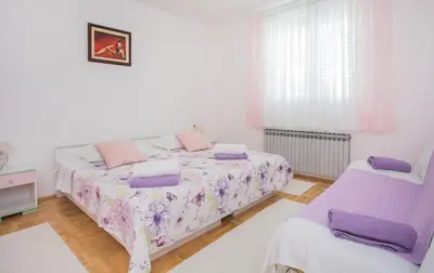 Krevet ili kreveti u jedinici u objektu Apartmani Branko Lemac