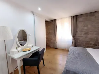 Krevet ili kreveti u jedinici u objektu Rialto Luxury Rooms and Apartments