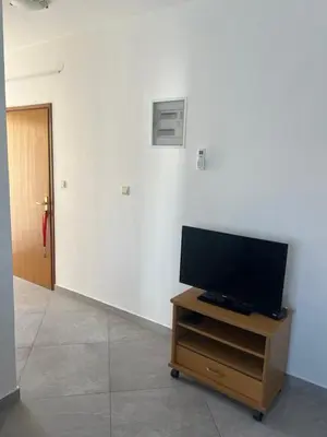 TV i/ili zabavni centar u objektu Sunce Mobile Homes & apartments
