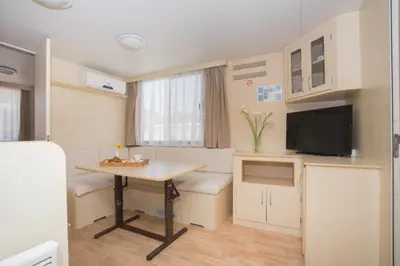 TV i/ili zabavni centar u objektu Sunce Mobile Homes & apartments