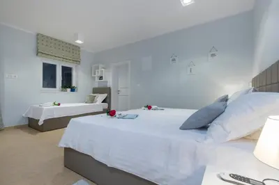 Krevet ili kreveti u jedinici u objektu Villa Terra Rogoznica