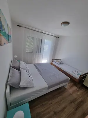 Krevet ili kreveti u jedinici u objektu Apartman Frketić