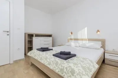Krevet ili kreveti u jedinici u objektu Apartmani Gabriella