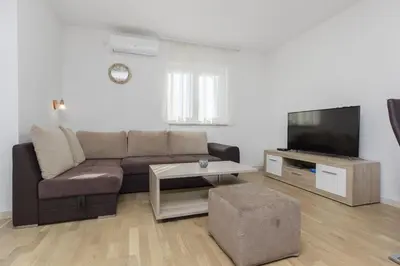 TV i/ili zabavni centar u objektu Apartmani Gabriella