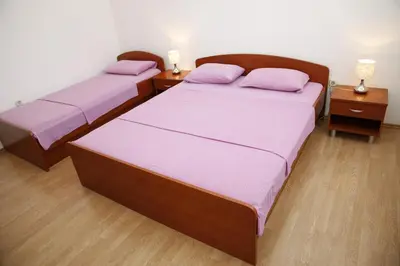 Krevet ili kreveti u jedinici u objektu Apartmani Šprljan