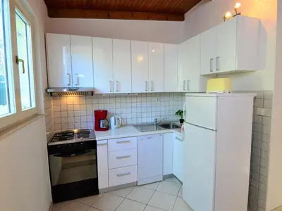 Kuhinja ili čajna kuhinja u objektu Holiday Home Camp Marko-4 by Interhome