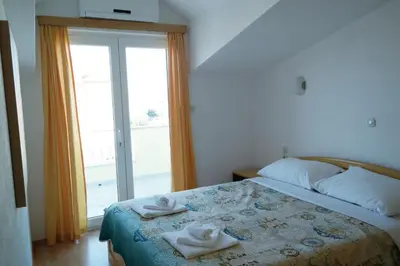 Krevet ili kreveti u jedinici u objektu Apartments gabrijel
