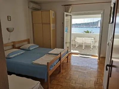 Krevet ili kreveti u jedinici u objektu Apartments by the sea Rogoznica - 12995