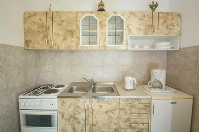 Kuhinja ili čajna kuhinja u objektu Apartments by the sea Rogoznica - 12995