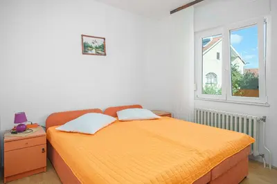 Krevet ili kreveti u jedinici u objektu Apartments and Rooms Josipa