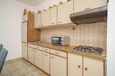 Kuhinja ili čajna kuhinja u objektu Apartments and Rooms Josipa