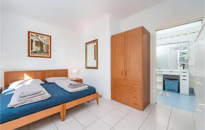 Krevet ili kreveti u jedinici u objektu Six-Bedroom Holiday Home In Primosten
