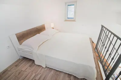 Krevet ili kreveti u jedinici u objektu Apartmani Daniela