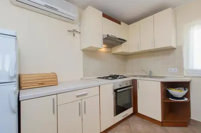 Kuhinja ili čajna kuhinja u objektu Bulat Sea View Apartments